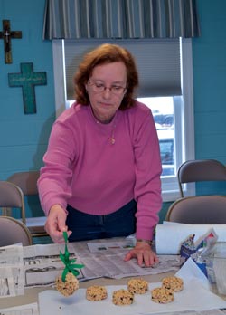 GEM volunteer Susan Darling helps during Harmony Café