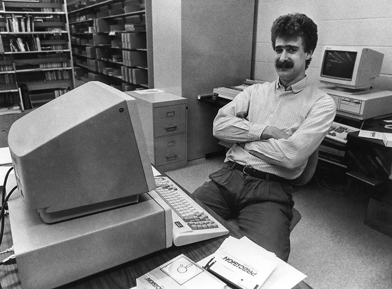 David Minor, computer specialist and assistant curator, one of the first employees of the Outer Banks History Center, 1989. Image courtesy of Drew C. Wilson Photographs Collection, AV.5137, Outer Banks History Center.