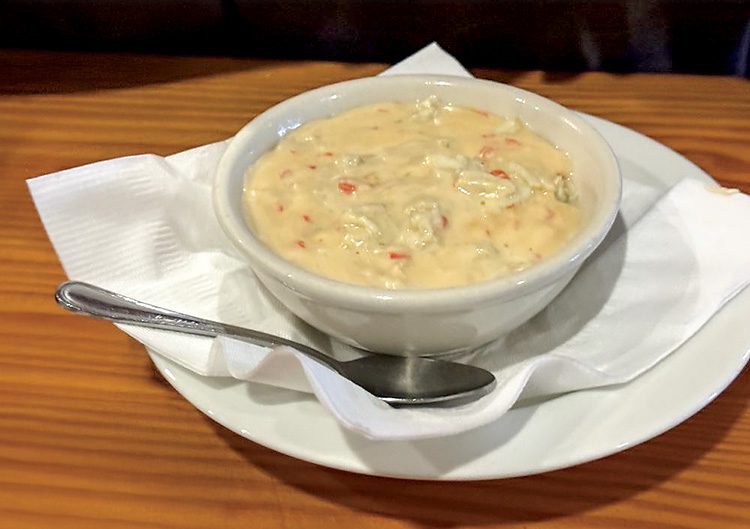 Basnight’s Lone Cedar Café’s jumbo lump she crab soup in sherry-laced cream. Photo by Britt S. for Yelp.