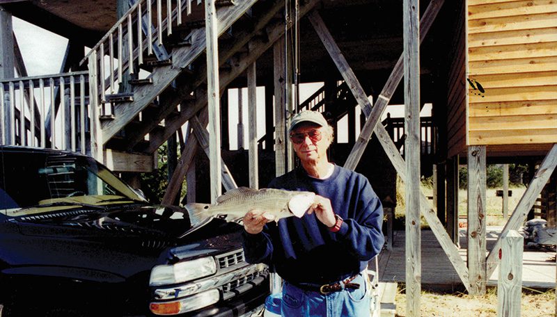 Richard posed with his catch under the newly built “Twenty Year Wish”. Photo courtesy of Todd Shoaf.