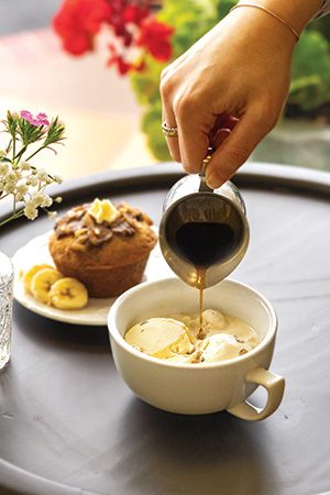 Lili’s Café’s Pistachio Affogato, an authentic Italian blend of ice-cold gelato and espresso, topped with pistachios. We chose to pair it with their banana nut bread, the pastry of the day.