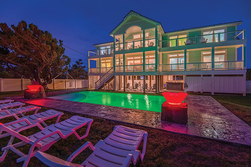 As the sun sets, color and light take over—creating an entirely different energy that keeps guests outside well into the evening. The Salt House from Joe Lamb Jr.