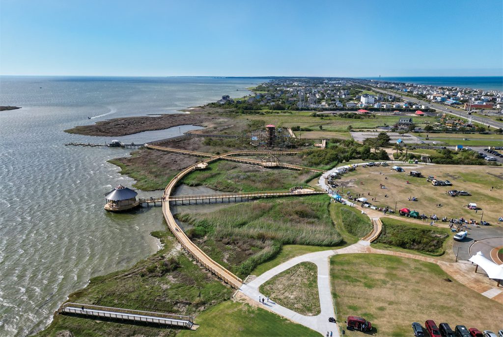 The Soundside Event Site Boardwalk in Nags Head provides a scenic, accessible pathway connecting public spaces along the sound, supported in part by Dare County Tourism Board funding.
